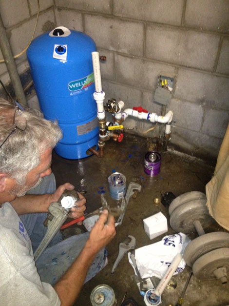 Water well pressure tank installation